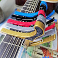 Miniatyrbild 3 av 3: Starlight-gitarrkapo, 5 stycken Gitarrkapo Capotasto Chitarra Gitarrkapo för akustisk folk-, klassisk gitarr, ukulele (svart, röd, blå, guld, silver)