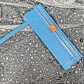 Miniatyrbild 1 av 5: Papperskärare Liten Mini Fällbar Genomskinlig Skala Gratfri Kolstål Skärning Scrapbook Papper Trimmer Blå