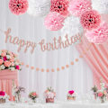 Pikkukuva 2 / 5: Ruusukultainen set , jossa on kimalteleva Happy Birthday -banneri, pehmopaperit, pyöreät pisteseppeleet ja pom-seppeleet