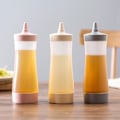 Pikkukuva 1 / 3: Helppo Puristava Lettupannu Dispenser Tiivistysletkulla ja Mittamerkinnällä