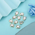 Miniatyrbild 2 av 8: 10 st sy rhinestones gyllene klo DIY rosett kläder tillbehör 7x10mm vit
