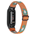 Pikkukuva 1 / 5: Fitbit Inspire 3 Nylon-punottu Solo Loop -urheiluranneke - Musta Oranssilla Daisy-kuviolla