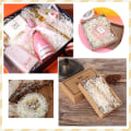 Miniatyrbillede 5 af 5: Hvid Raffia Strimlet Papir - 100g, Perfekt til Gavekurve og Festdekorationer