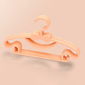 Miniatyrbillede 2 af 6: 10 STK børneopbevaringsbøjler plastik tyk bue knude frakketørrer bøjle til småbørn Baby Orange