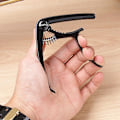 Miniatyrbillede 3 af 3: Guitar Capo og Stemmer Set