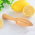 Miniatyrbild 1 av 4: Trä Citruspress - 4-delad apelsin- och citronpress