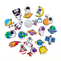 Pikkukuva 2 / 5: Sarjakuva Astronaut- set – 20 osaa tee-se-itse-koristeluun, juhliin ja rei'itetyihin kenkiin