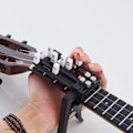 Miniatyrbild 3 av 5: Bärbar Ukulele Finger E x erciser Gitarrackord Träningsverktyg för Nybörjare