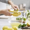 Miniatyrbillede 2 af 4: Nem Manuel Citron-Lime Squeezer - Effortløs Citrusjuiceudvinding