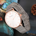 Miniatyrbillede 2 af 4: Vandtæt legering Watch Rund Urskive Analog Display Kvinder Kvarts Kvinder Armbåndsur Rose Gold & White