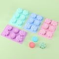 Pikkukuva 1 / 5: Set 4 silikonista molds - 6 kukkaa per mold - Jääpalojen, suklaiden ja kakkukoristeiden valmistukseen - Värit: violetti, vihreä ja pinkki