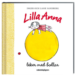 Lilla Anna leker med bollar