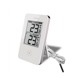 Digital termometer som mäter temperaturen både inne och ute.