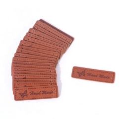 50 st gör-det-själv brun gjord med hjärta PU-läder handgjorda etikettetiketter N8