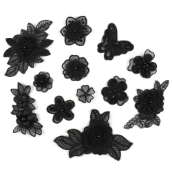12 st spetslappar, svart broderade blomspetsar på lappar Sy