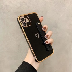 iPhone 13 skal med hjärta och vristband gulddetaljer pastell Black one size
