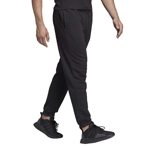 Adidas Långbyxor Essentials Linear French Terry Svart S / Regular Man