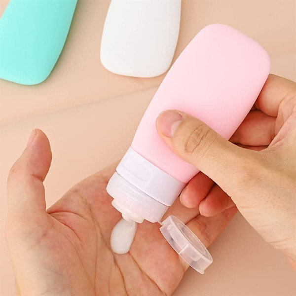 UNIQ Uudelleenkäytettävät Silikoniset Matkapullot - 4 kpl - 60ml