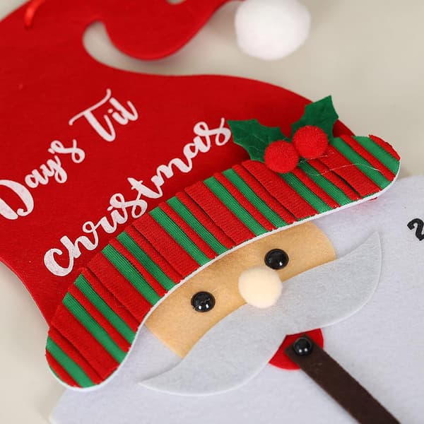 Julekalender med hengende julenisse - nedtelling til jul