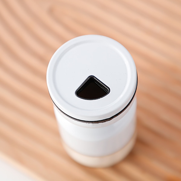 Hvidt salt- og pebersæt i glas med justerbar hældetud