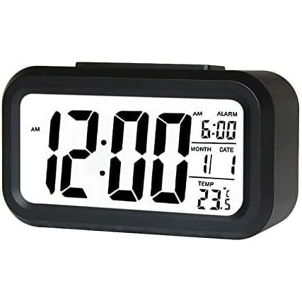 Hiljainen LCD-herätyskello valolla, päivämäärällä, kalenterilla ja lämpötilalla