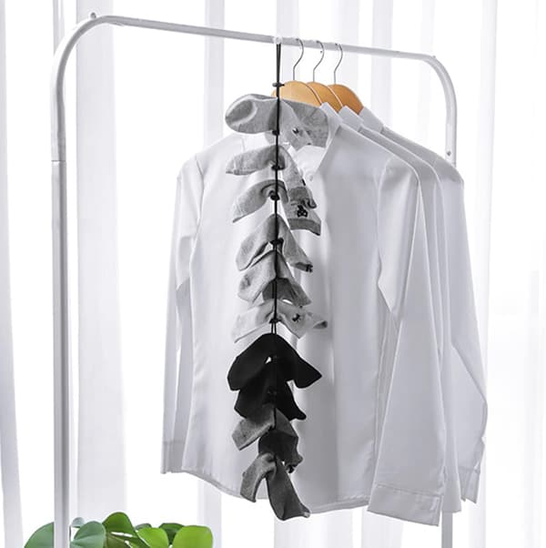 Svart 2-pack elastiska strumphållare med 10 glidande öglor, hopfällbar
