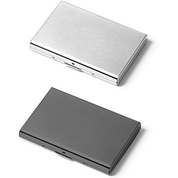 2 kpl (musta+hopea) ruostumattomasta teräksestä valmistettu korttipakkaus, metalliyritys