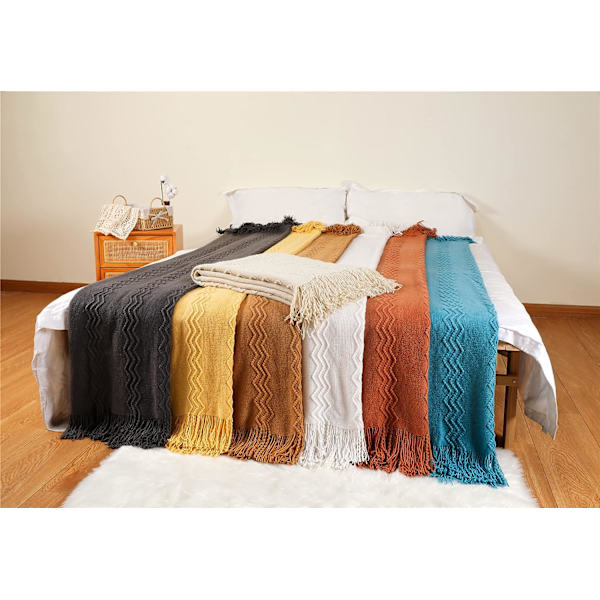 Bohemisk mjuk stickad filt med pompom beige - 127*17