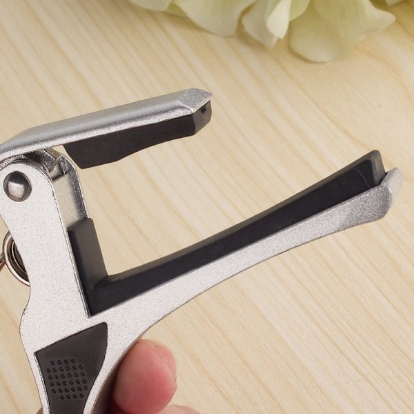 Metal capodaster, barre klemme