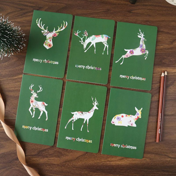 Julekort Julehilsen kort, liten hjort+julehuler