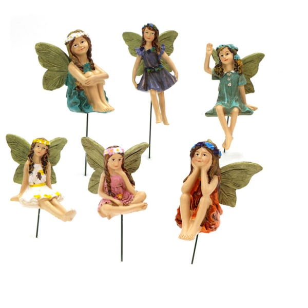 En set med 6 charmiga festatyer med vingar, trädgård eller heminredning
