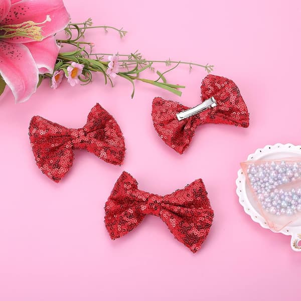 Set med 4 stora glitterröda glitterhårnålar i nylon