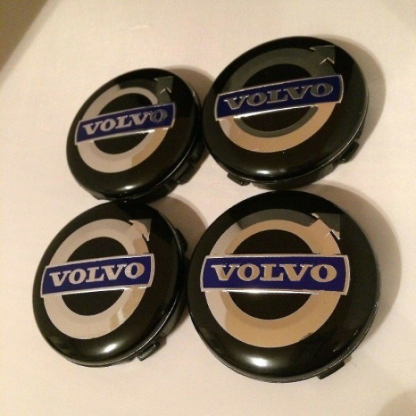 4 Volvo 60 mm hub caps in the middle