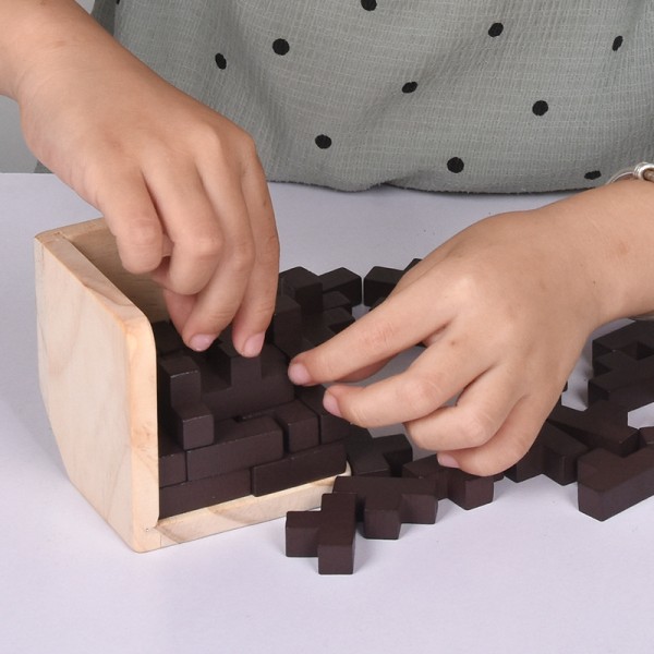 3D träpussel av. T-format pussel. Pedagogisk leksak för barn