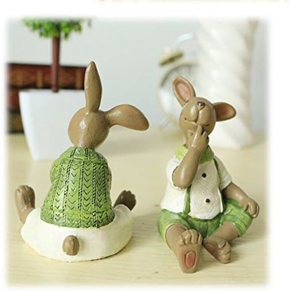 2 stk. harpiks harefigurer siddende