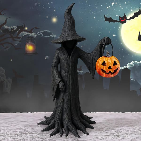 Heksefigur til Halloween, heksefigur med en spand