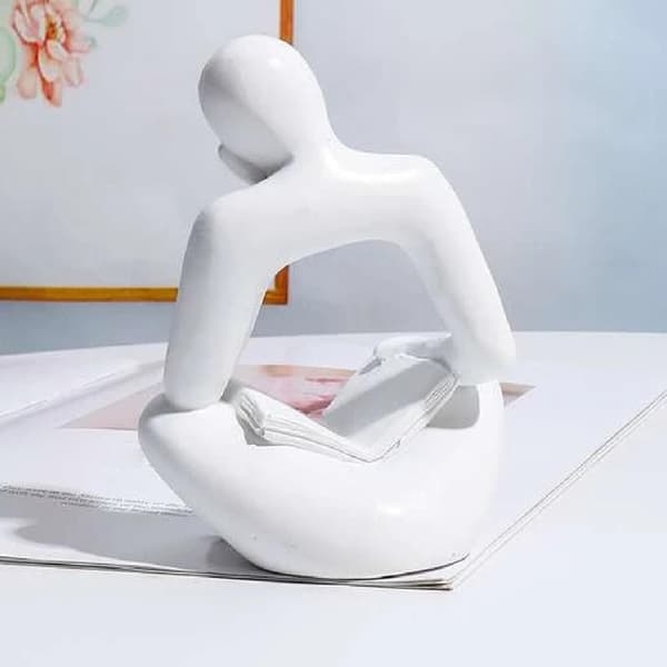 Moderne, leken, sklisikker skulptur, moderne estetikk, bokstøtter i harpiks.