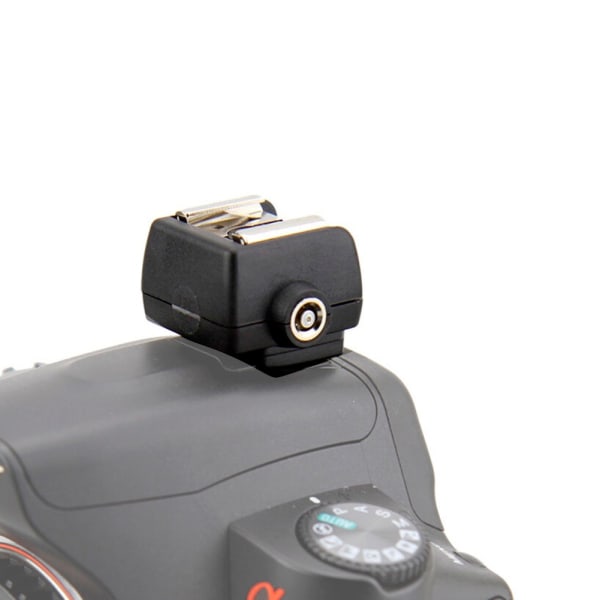 Muovinen Hot Shoe -sovitin Alpha Flash -kameralle