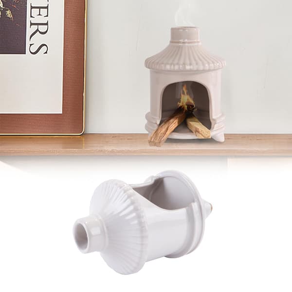 Mini hvid pejs med håndlavet keramisk brænder.