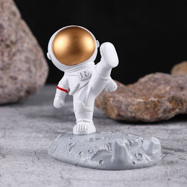 Sød tegneserie mobiltelefonholder syntetisk harpiks skrivebords astronaut ornament til hjemmekontor bilindretning astronaut flyvende model (guld)