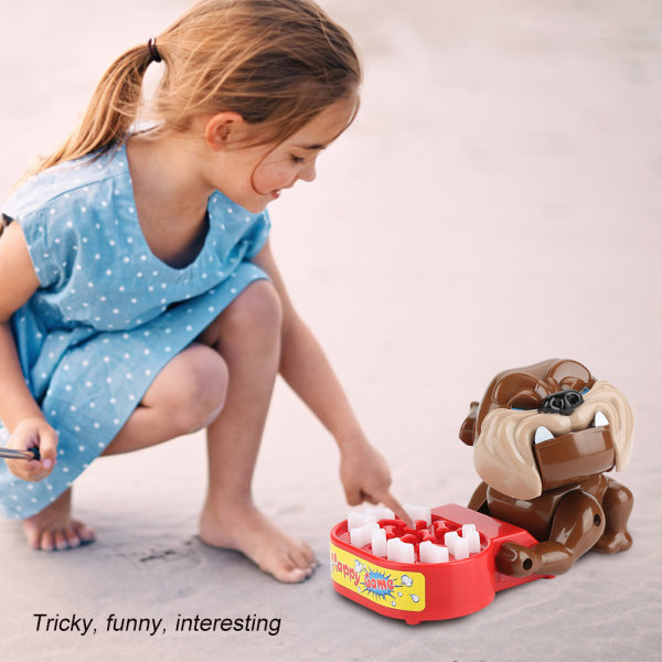 Hankalia hauskoja leluja pöytä Onnellisia pelejä Huono koira puristaa luita lasten vanhemmille