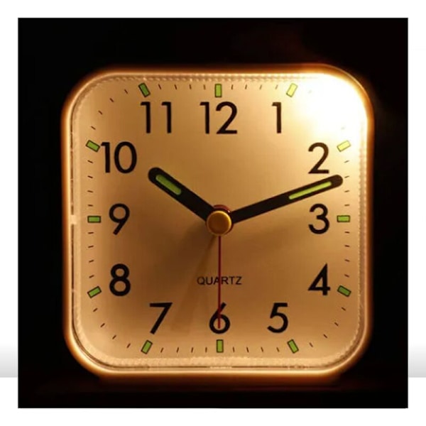 Tyst analog väckarklocka med snooze, ljus och volymkontroll, batteridriven