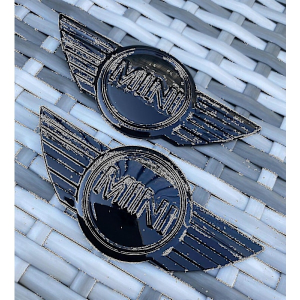 2x Mini R50 R56 R57 R58 R59 Kiiltävän mustat metalliset konepelti-/takaluukkulogot