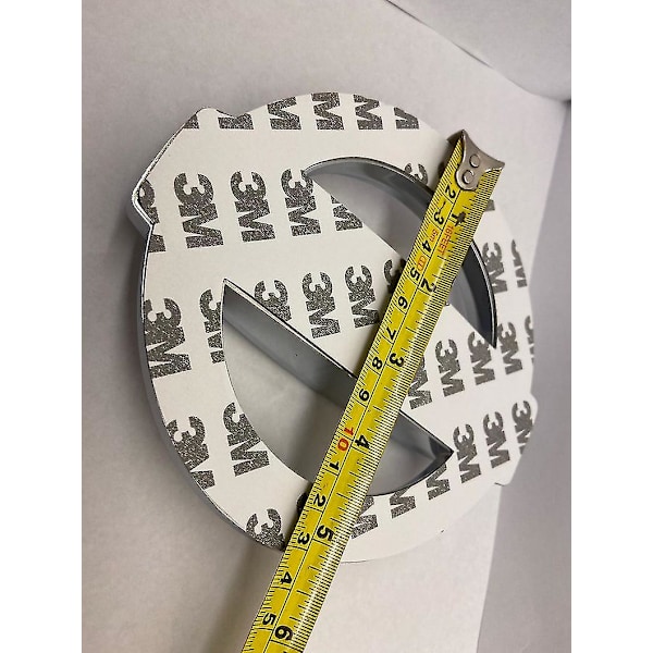 Nissan-emblem krom 15 cm x 13 cm bagklap