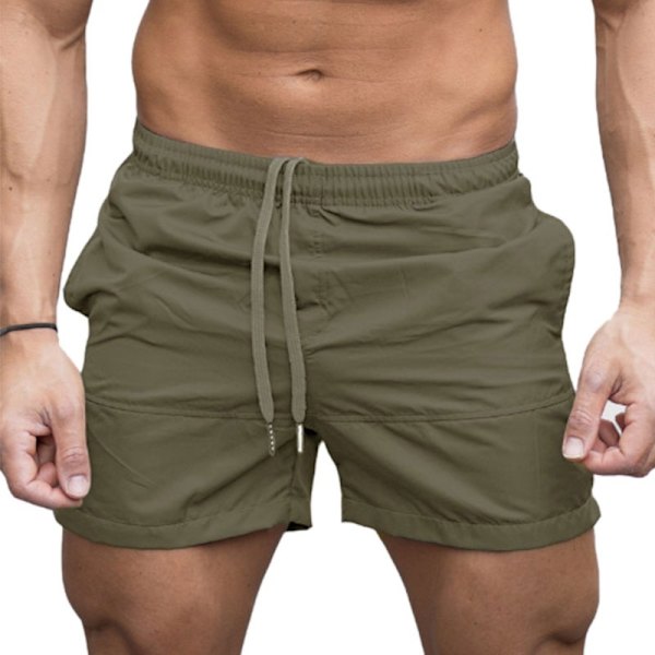 Muodikkaat miesten yksiväriset rantahousut. army green S