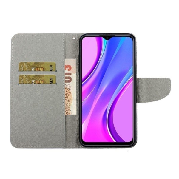 Wonderland Xiaomi Redmi 9C Flip etui - Blå sommerfugl Multicolor