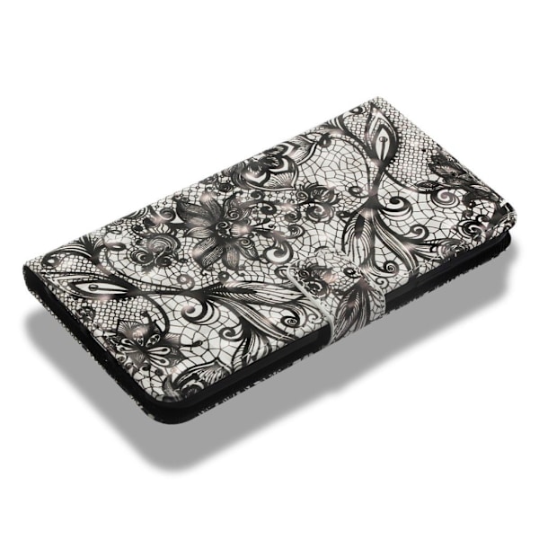 iPhone Xs Max mønstret læder flip cover - Sort Blomst Black
