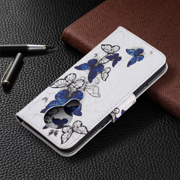 wonderland Nokia 3.4 flip etui - blå sommerfugle Blue