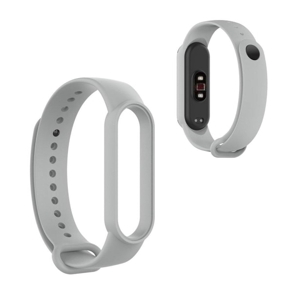 Xiaomi Mi Smart Band 6 / 5 glossy silicone watch band - Grey Silvergrå