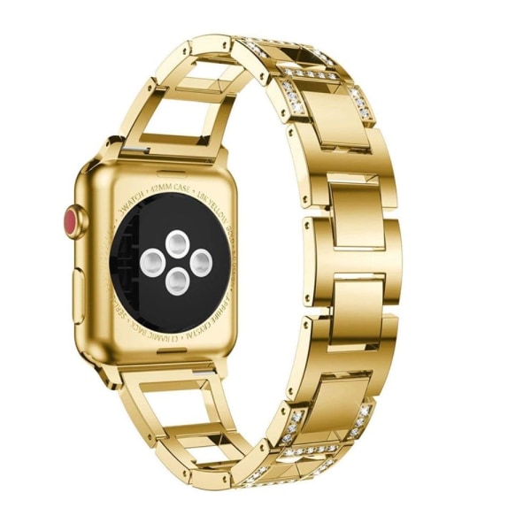 Apple Watch (45 mm) klockarmband med strassdekor i trapetsform - Guld Guld